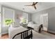 Bedroom with two beds and natural light from the window at 311 Rolling Rock Se Rd, Marietta, GA 30067