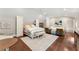 Large open bedroom featuring hardwood floors and seating at 311 Rolling Rock Se Rd, Marietta, GA 30067