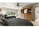 Bedroom featuring two beds, large windows, and a built-in bookcase at 311 Rolling Rock Se Rd, Marietta, GA 30067