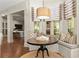 Cozy breakfast nook with a round table, built-in seating, and natural light at 311 Rolling Rock Se Rd, Marietta, GA 30067