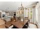 Open concept dining room with lots of natural light and a view of the kitchen at 311 Rolling Rock Se Rd, Marietta, GA 30067