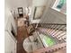 Spacious foyer offers staircase, custom rug, and door access to the outside at 311 Rolling Rock Se Rd, Marietta, GA 30067