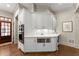 Convenient kitchen corner space with cabinetry, built-in oven, and drink fridge at 311 Rolling Rock Se Rd, Marietta, GA 30067