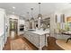 Beautiful kitchen with a large island, stainless steel appliances, and lots of natural light at 311 Rolling Rock Se Rd, Marietta, GA 30067