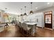 Spacious kitchen featuring an island with barstool seating and a full-sized refrigerator at 311 Rolling Rock Se Rd, Marietta, GA 30067