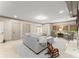 Spacious living room features a neutral color palette, a comfortable sofa and a rocking chair at 311 Rolling Rock Se Rd, Marietta, GA 30067