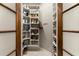 Walk-in pantry with ample shelving for organized storage of food items at 311 Rolling Rock Se Rd, Marietta, GA 30067