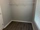Walk-in closet showcases a single shelf for storage, offering an organized and functional space at 519 Granite Nw Ct, Lawrenceville, GA 30044