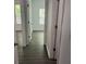 Hallway with dark floors that connect the rooms of the house at 519 Granite Nw Ct, Lawrenceville, GA 30044