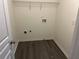 Laundry room features hookups for a washer and dryer, with electrical outlets for appliances at 519 Granite Nw Ct, Lawrenceville, GA 30044
