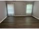 Spacious main bedroom with hardwood flooring and natural light at 519 Granite Nw Ct, Lawrenceville, GA 30044