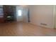 Inviting living room featuring a stone fireplace and modern laminate flooring at 61 Maxie Ln, Dallas, GA 30157