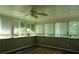Bright sun room with multiple windows offering abundant natural light at 61 Maxie Ln, Dallas, GA 30157