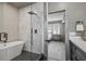 Elegant bathroom featuring freestanding tub, glass shower, and stylish tile work at 2809 Glenwood Se Ave, Atlanta, GA 30317