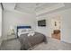 Comfortable bedroom featuring a cozy queen bed and a view into the hallway at 2809 Glenwood Se Ave, Atlanta, GA 30317