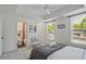 Cozy bedroom with natural light, a view to the backyard, and a ensuite bathroom at 2809 Glenwood Se Ave, Atlanta, GA 30317