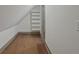 A walk-in closet features hardwood floors, built in shelving and a neutral color palette at 2809 Glenwood Se Ave, Atlanta, GA 30317