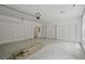 A spacious garage features multiple storage closets and a roll-up door at 2809 Glenwood Se Ave, Atlanta, GA 30317
