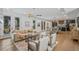 Open-concept living space with wood floors, leading to a modern kitchen and dining area at 2809 Glenwood Se Ave, Atlanta, GA 30317