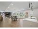 Open-concept living space featuring a dining area, living room, and a kitchen island at 2809 Glenwood Se Ave, Atlanta, GA 30317