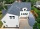 Aerial view of the rear exterior featuring a two-car garage and stone driveway at 2809 Glenwood Se Ave, Atlanta, GA 30317