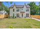 A modern home featuring a rear exterior with a well-maintained lawn and a gray trim at 2809 Glenwood Se Ave, Atlanta, GA 30317