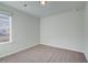 Bedroom featuring neutral carpet, light gray walls, and a window at 321 Heavenly Hollow Pl, Mcdonough, GA 30253