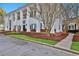 The grand clubhouse featuring classic architectural design and a welcoming entrance at 160 Isleworth Way, Fayetteville, GA 30215