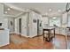 Bright kitchen featuring white cabinetry, a wooden island, and hardwood floors at 160 Isleworth Way, Fayetteville, GA 30215