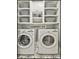 Well-organized laundry room with built-in shelving, modern washer and dryer, and stylish decor at 160 Isleworth Way, Fayetteville, GA 30215