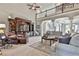 Bright living room with a fireplace, vaulted ceilings, entertainment center and plenty of seating at 160 Isleworth Way, Fayetteville, GA 30215