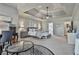 Spacious primary suite featuring a seating area, an ensuite bath and plush carpeting at 160 Isleworth Way, Fayetteville, GA 30215