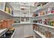 Walk-in pantry with lots of shelving and storage for organized kitchen supplies at 160 Isleworth Way, Fayetteville, GA 30215