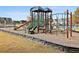 Community playground with slides and climbing structures for enjoyment at 160 Isleworth Way, Fayetteville, GA 30215