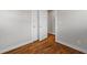 Bedroom featuring hardwood floors, white trim, and neutral wall color at 2677 Tilson Rd, Decatur, GA 30032