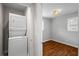 Efficient laundry room with stacked washer and dryer, adjacent to room at 2677 Tilson Rd, Decatur, GA 30032