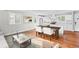 Open concept living space with modern kitchen, dining area, and comfortable seating at 2677 Tilson Rd, Decatur, GA 30032