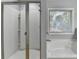 Bright bathroom featuring a large shower and soaking tub beneath a window at 3351 Vintage Se Cir, Smyrna, GA 30080