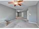 Open layout bedroom with neutral walls, plush carpet flooring and fan fixture overhead at 3351 Vintage Se Cir, Smyrna, GA 30080