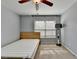 Bedroom featuring a bed, ceiling fan, and natural light from the window at 3351 Vintage Se Cir, Smyrna, GA 30080