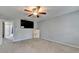 Bedroom featuring a TV and artwork with doors leading to other rooms at 3351 Vintage Se Cir, Smyrna, GA 30080