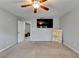 Spacious bedroom with a TV and artwork, leading to an ensuite bathroom and walk-in closet at 3351 Vintage Se Cir, Smyrna, GA 30080