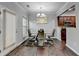 Dining room with hardwood floors and modern chandelier at 3351 Vintage Se Cir, Smyrna, GA 30080
