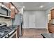 Modern kitchen with stainless steel appliances and dark hardwood floors at 3351 Vintage Se Cir, Smyrna, GA 30080