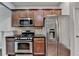 Modern kitchen featuring stainless steel appliances and ample cabinet space at 3351 Vintage Se Cir, Smyrna, GA 30080