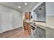 Modern kitchen features granite countertops, stainless steel dishwasher, and wood cabinets at 3351 Vintage Se Cir, Smyrna, GA 30080