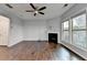 Spacious living room with hardwood floors, fireplace, and neutral color palette at 3351 Vintage Se Cir, Smyrna, GA 30080