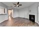 Open living room with hardwood floors and fireplace at 3351 Vintage Se Cir, Smyrna, GA 30080