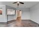 Spacious living room featuring hardwood floors and a breakfast bar to the kitchen at 3351 Vintage Se Cir, Smyrna, GA 30080