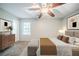 Bedroom features carpet flooring, a ceiling fan, and decor to showcase this space at 1934 Patton Pl, Lithonia, GA 30058